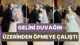 Duvağın Üzerinden Öpmeye Çalışan Damat, Geleni Kızdırdı
