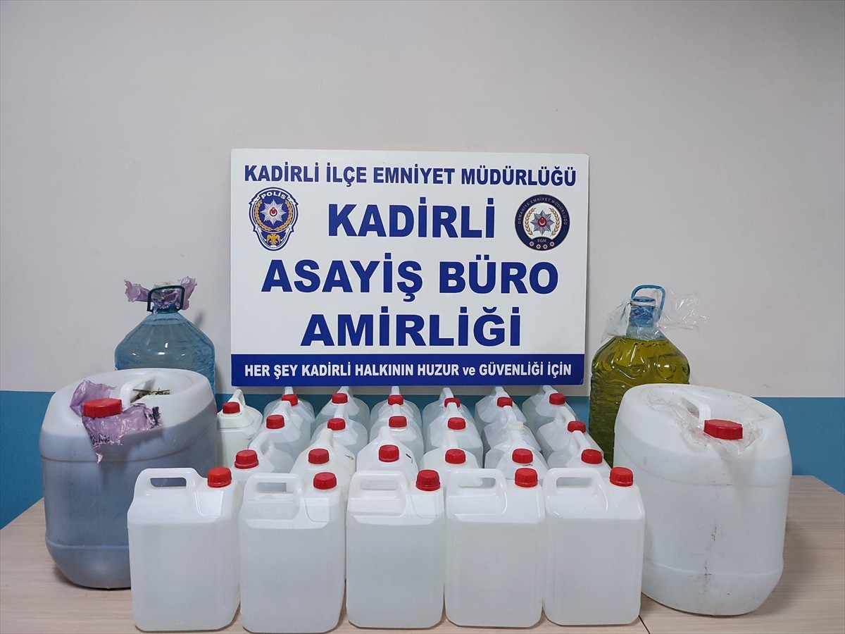 Osmaniye'nin Kadirli ilçesinde sahte içki üretimi yaptığı iddiasıyla gözaltına alınan 3 zanlıdan...